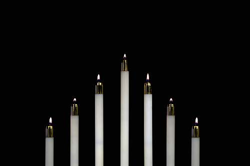 candle seven white candles closeup photography fort collins